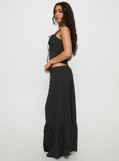   side view of model wearing Princess Polly Modern Girl Maxi Skirt Black / Polka Dot Skirts 