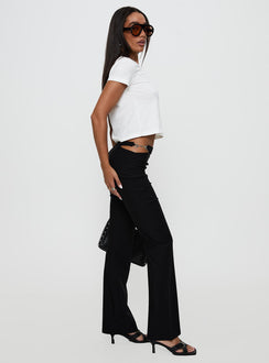 side view of model wearing Princess Polly Eyes On You Flare Pants Black High Waisted Pants 