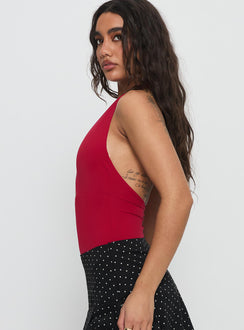 side view of model wearing Princess Polly Sugarberry Cut Out Bodysuit Red Sleeveless Bodysuit 