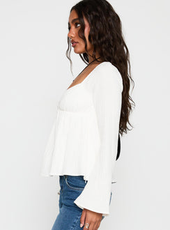 side view of model wearing Princess Polly Khalea Long Sleeve Top White Full Sleeves Sweetheart 
