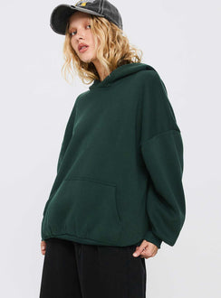 side view of model wearing Princess Polly Good Luck Graphic Hoodie Green / Blue Longline Jumpers Jumpers 