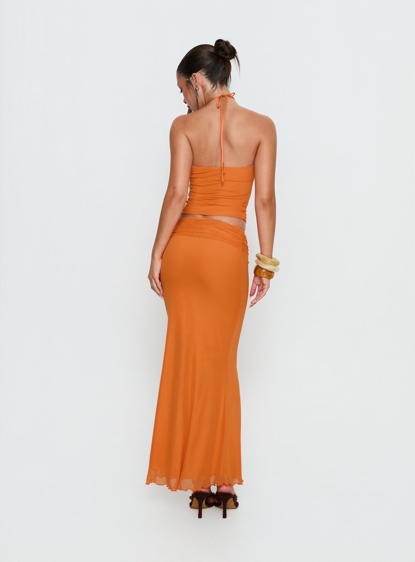 back view of model wearing Princess Polly Star Fruit Ruched Waist Maxi Skirt Orange Maxi Skirts 