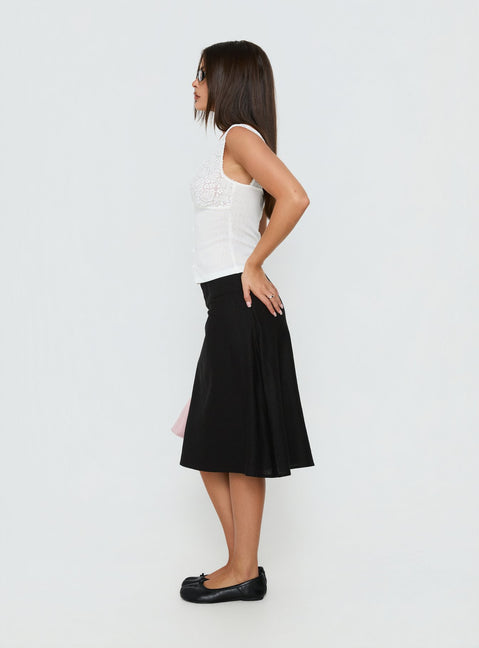 Presenting the Such Delight Linen Midi Skirt Black womens-skirts with relaxed aline silhouette side view of model wearing