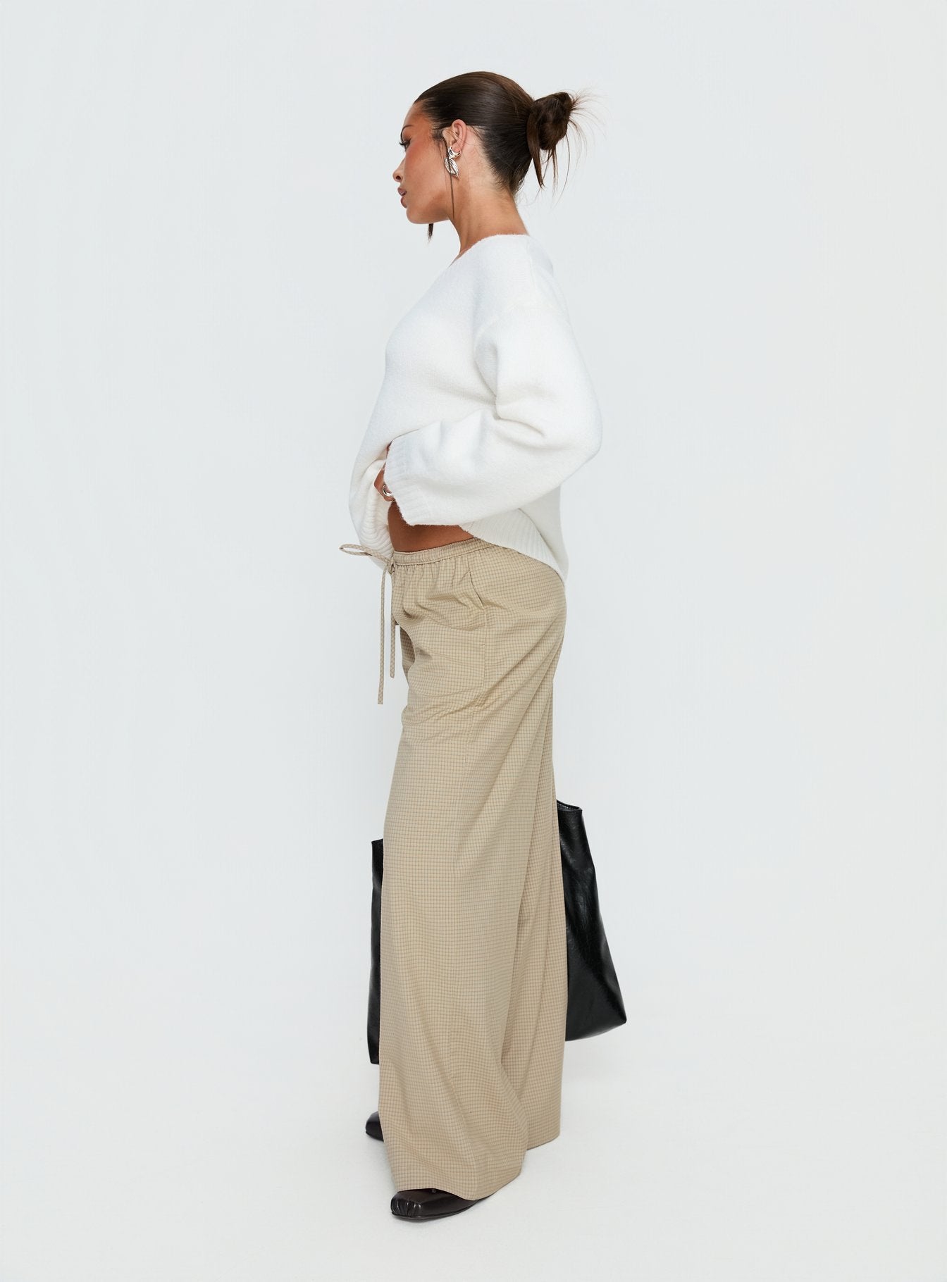 side view of model wearing Princess Polly Ketrina Tie Waist Pants Beige Plaid Mid Rise Pants 