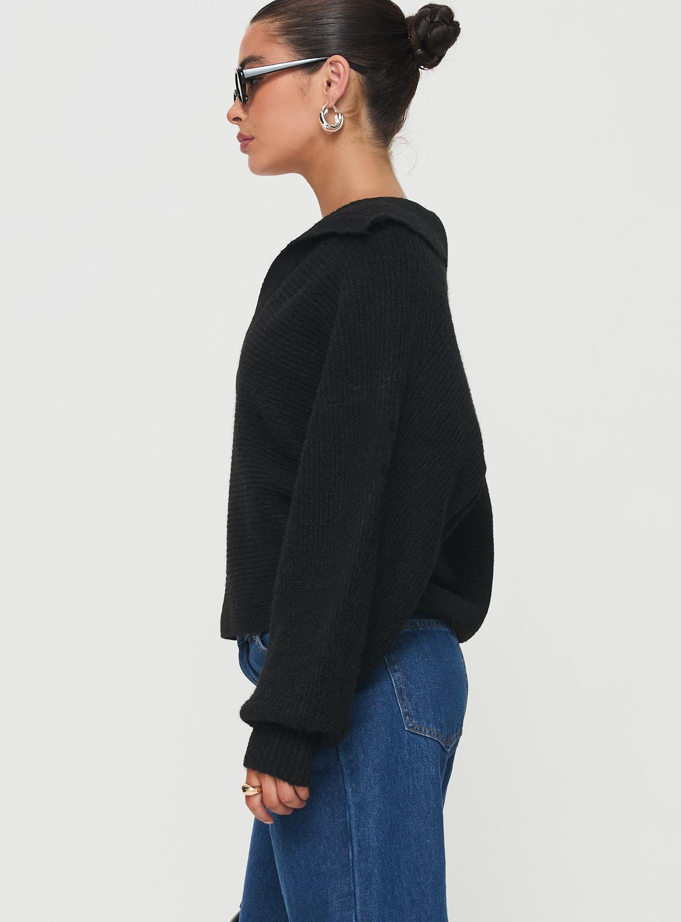 side view of model wearing Princess Polly Bella Notched Neck Sweater Black Cropped Jumpers Jumpers 