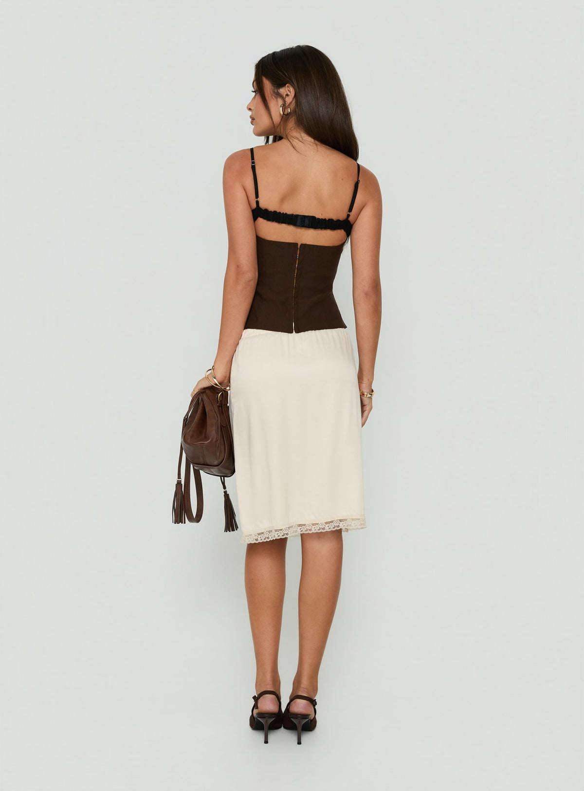 Crafted with the Bella Lace Trim Midi Skirt Butter in womens-skirts featuring midi length back view of model wearing