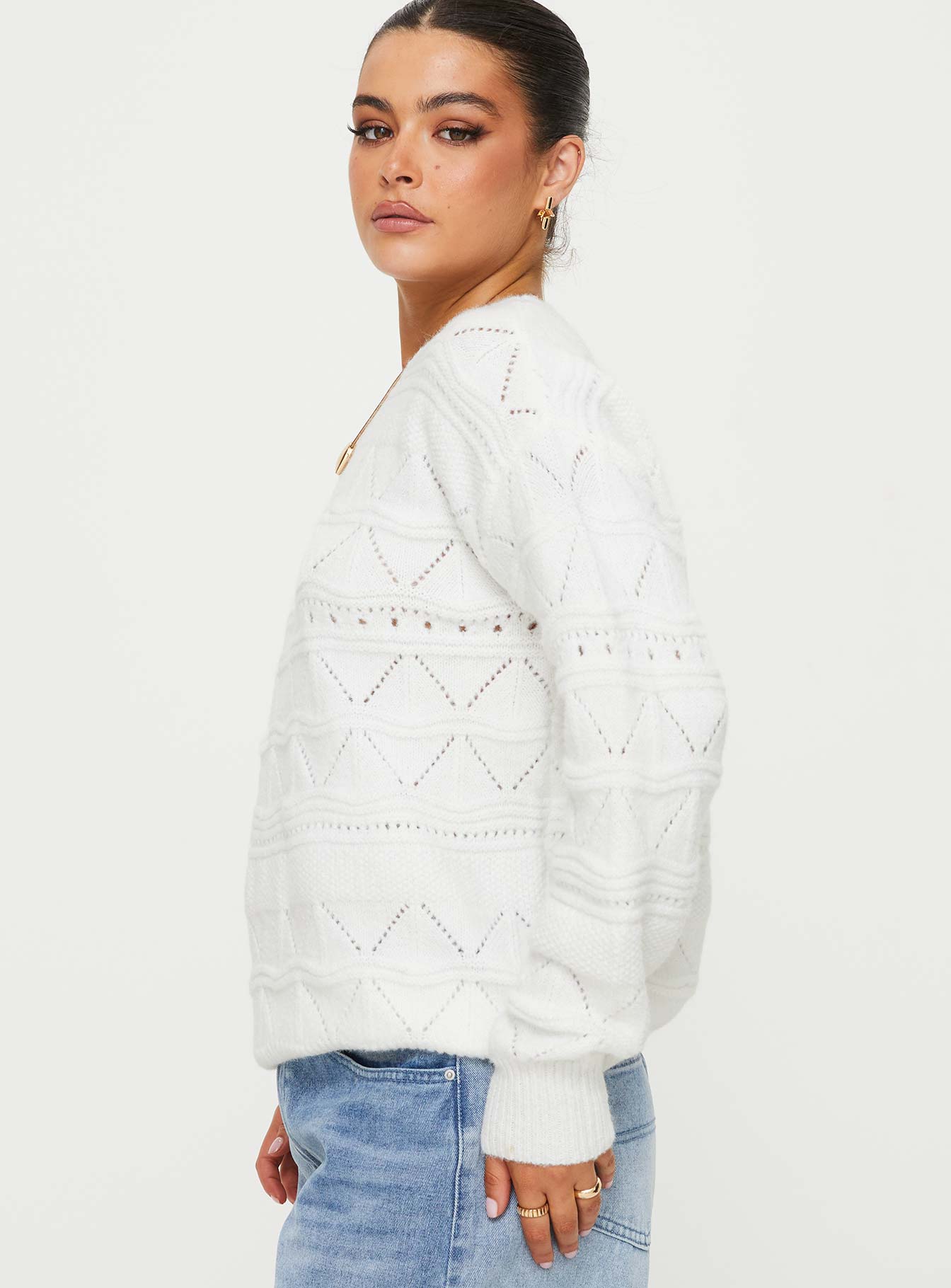 side view of model wearing Princess Polly Pierce Pointelle Sweater Cream Long 