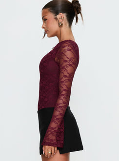 side view of model wearing Princess Polly Macaria Long Sleeve Lace Bodysuit Red Long Sleeve Tops 