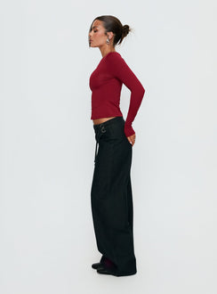 side view of model wearing Princess Polly Boxie Mid Rise Wide Leg Jeans Washed Black Mid Rise Jeans 