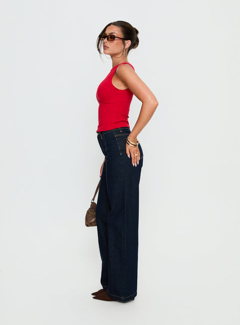 side view of model wearing Princess Polly Cadance High Rise Straight Leg Jeans Indigo High Rise Jeans 