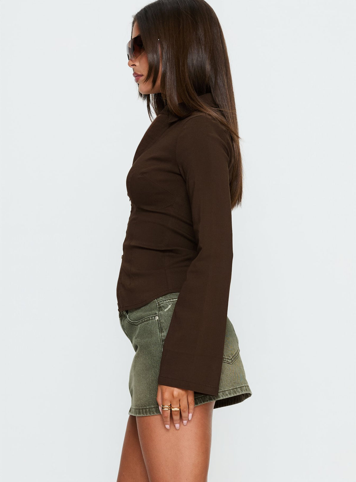   side view of model wearing Princess Polly Laynee Butterfly Mini Skirt Washed Green Mini Skirts 