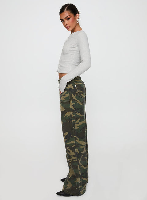 side view of model wearing Princess Polly Briony Mid Rise Wide Leg Jeans Camouflage Low Rise Jeans Jeans 