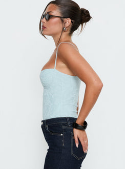side view of model wearing Princess Polly Alorah Textured Bodysuit Blue Sleeveless 