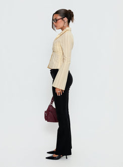 side view of model wearing Princess Polly Dariana Flare Pants Black Mid Rise Pants 