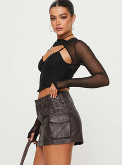   side view of model wearing Princess Polly Domenic Faux Leather Mini Skirt Washed Black Tall Mini Skirts 