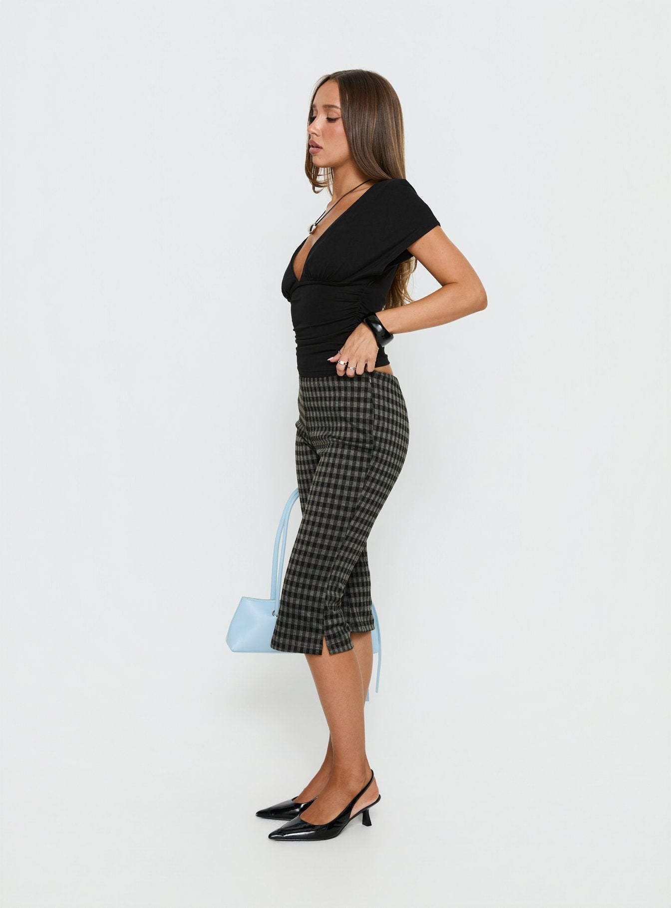 side view of model wearing Princess Polly Lights Are Off Capri Pants Multi Mid Rise Pants 