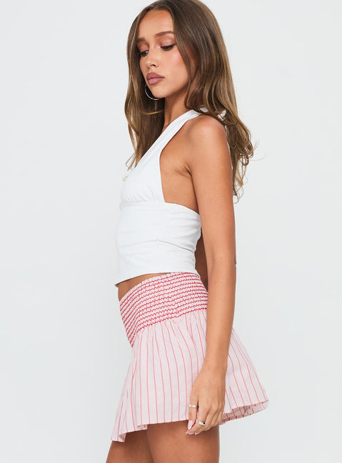   side view of model wearing Princess Polly Lilypilly Shirred Mini Skirt Pink Multi Mini Skirts 