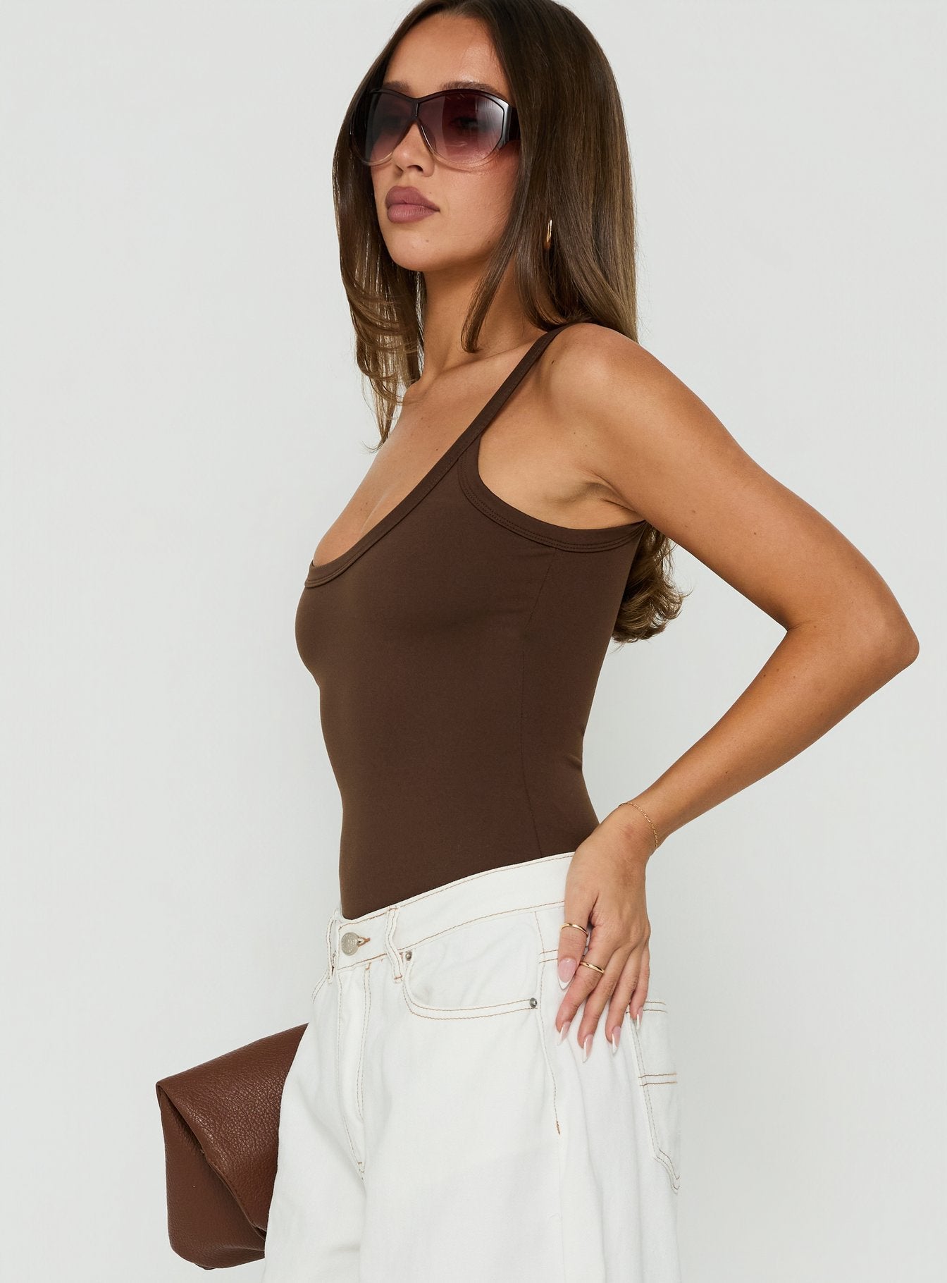 Explore the Daily Define Kasper Bodysuit Brown womens-bodysuit in sleeveless design side view of model wearing Princess Polly