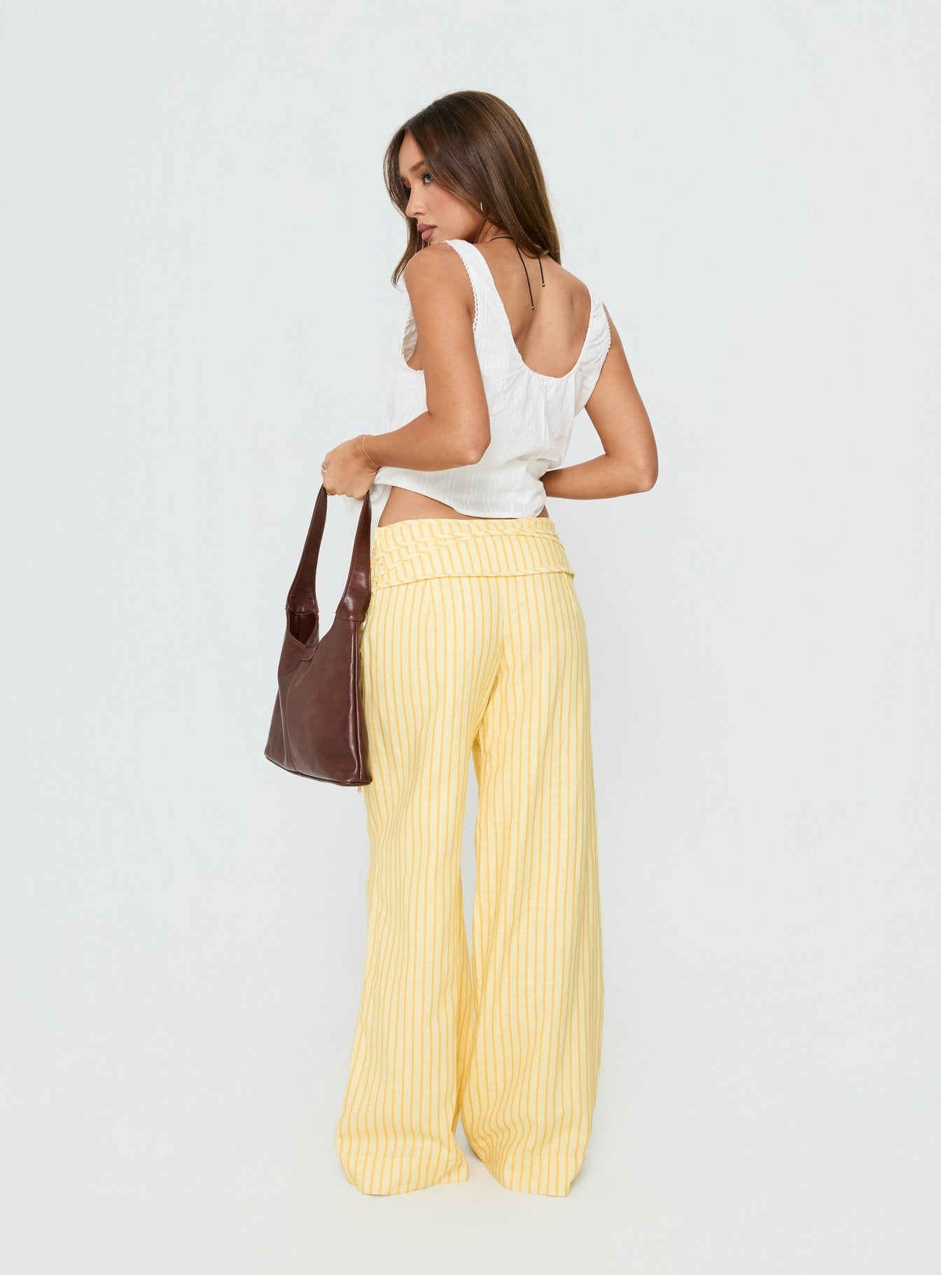 back view of model wearing Princess Polly Silver Moon Pants Yellow Stripe Low Rise Pants 
