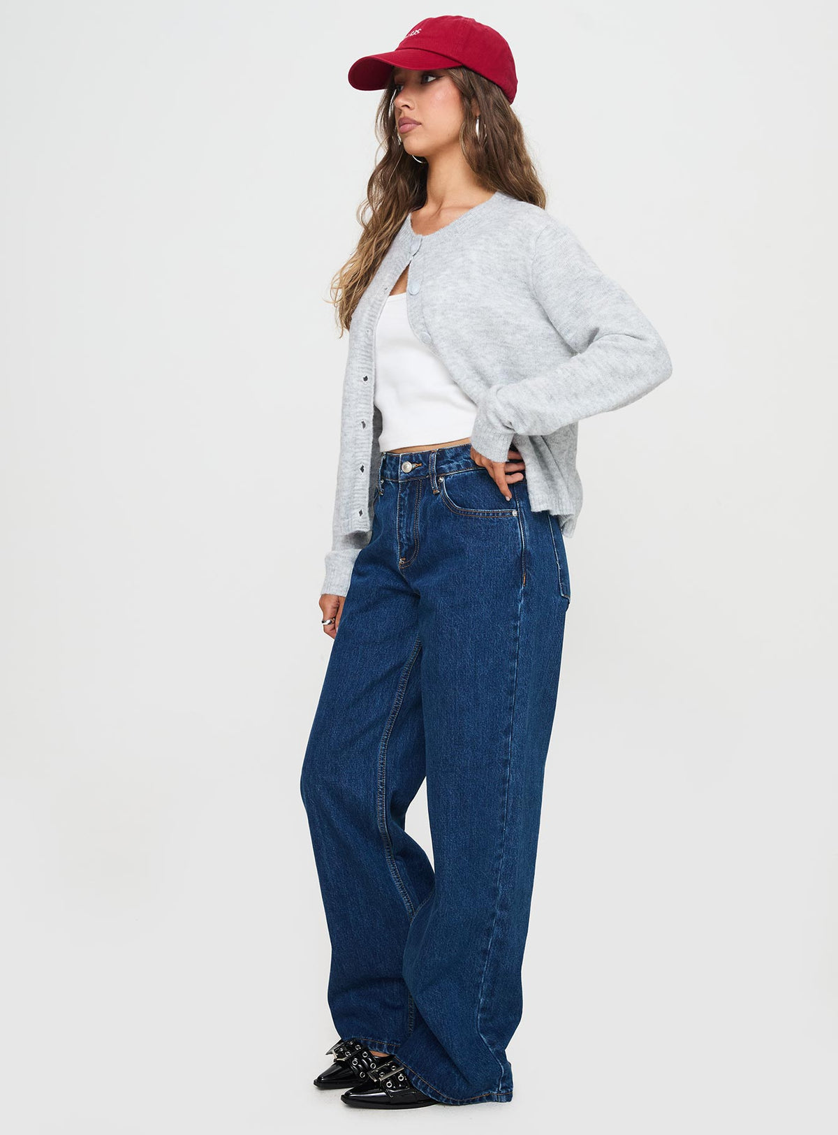 back view of model wearing Princess Polly Shima Low Rise Slouch Jeans Mid Wash Mid Rise 