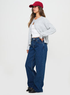 back view of model wearing Princess Polly Shima Low Rise Slouch Jeans Mid Wash Mid Rise 