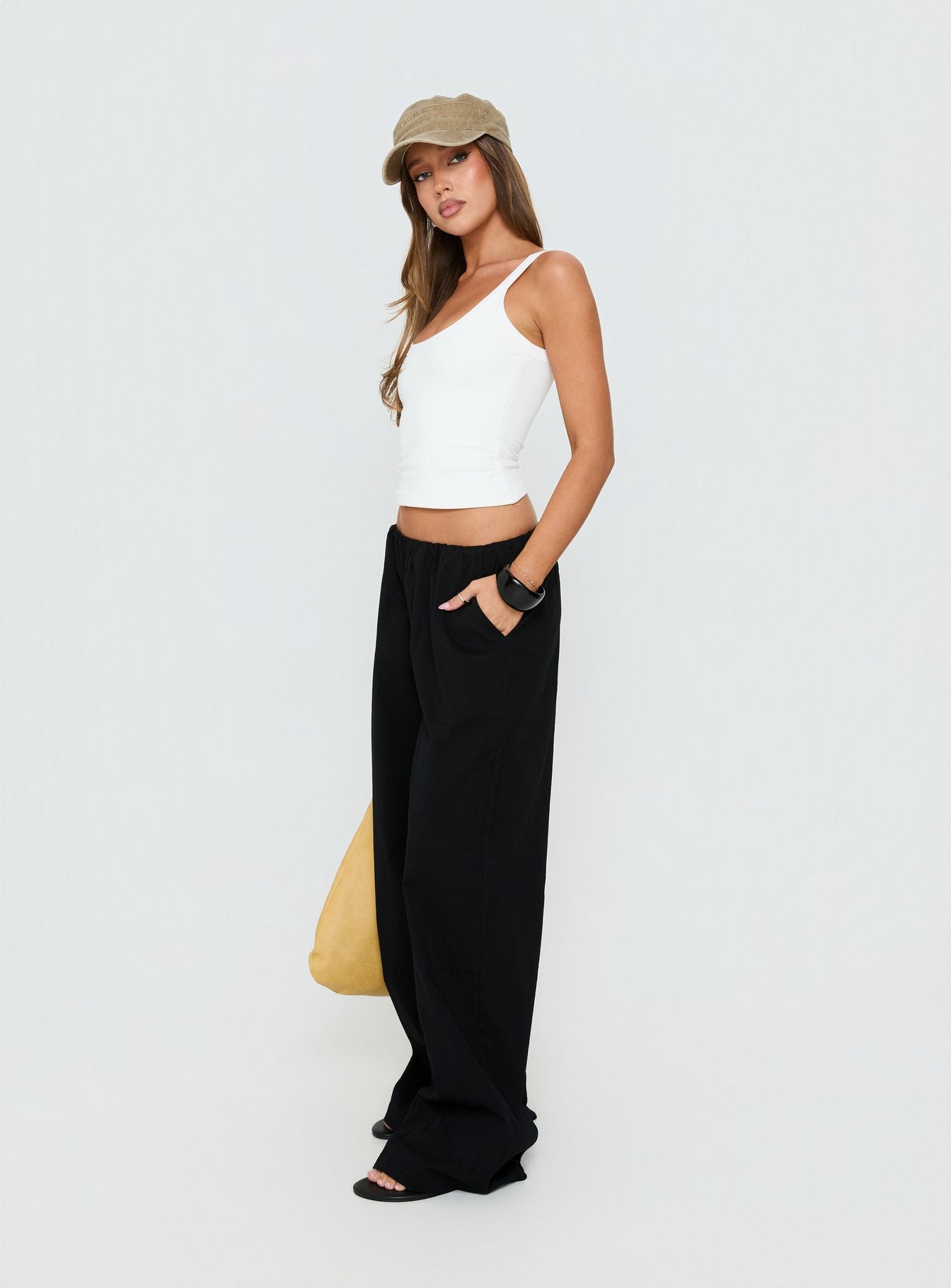 Showcasing Lunea Concealed Waistband Pants Black in womens-regular-pants with high-rise front view of model wearing Princess Polly