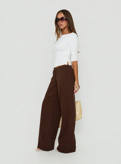 Highlighting the Hereos Mid Rise Baggy Leg Jeans Washed Chocolate in womens-jeans on-body view of model wearing Princess Polly