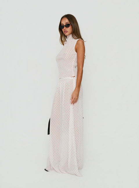 The Ford Maxi Skirt White Red Polka Dot in womens-skirts featuring maxi length side view of model wearing Princess Polly