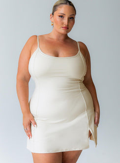 Beige activewear dress flattering scoop-neck shape that feels comfortable and unrestrictive built in shorts