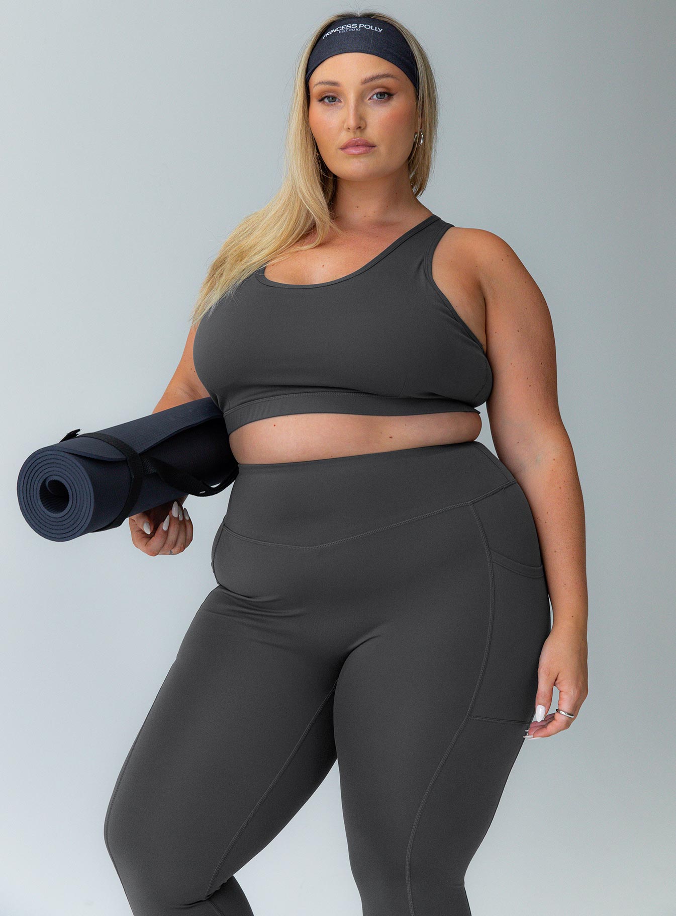 Grey leggings Featuring a high waisted design & twin slip leg pockets