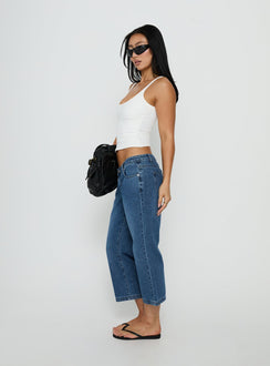 Crafted from Hierarchy Low Rise 3/4 Length Jeans Mid Wash womens-jeans with low-rise waist side view of model wearing Princess Polly