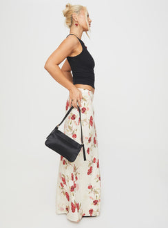   side view of model wearing Princess Polly Jodie Maxi Skirt Cream / Floral Maxi Skirts Skirts 