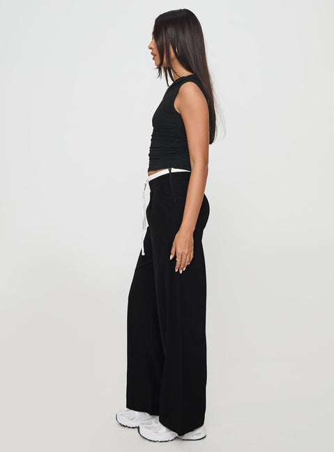 side view of model wearing Princess Polly Burna Pants Black High Waisted Pants 