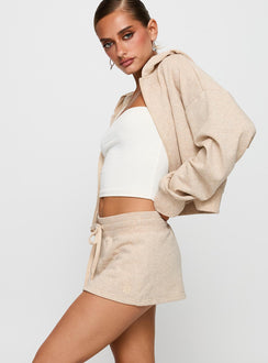 side view of model wearing Princess Polly Down Low Fleece Skort Oat Marle 