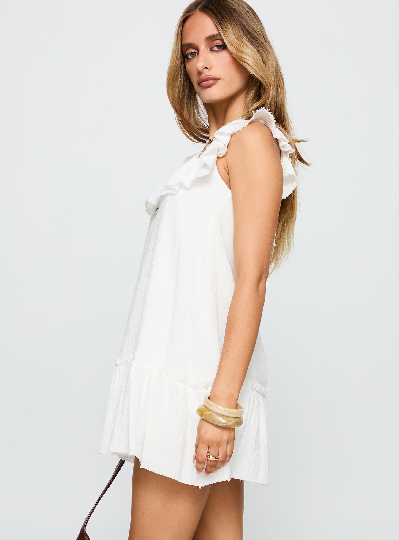 side view of model wearing Princess Polly Alicen Frill Mini Dress White Square Neck 