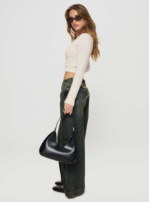 side view of model wearing Princess Polly Ribbon Stamp Wide Leg Jeans Antique Wash Mid Rise 