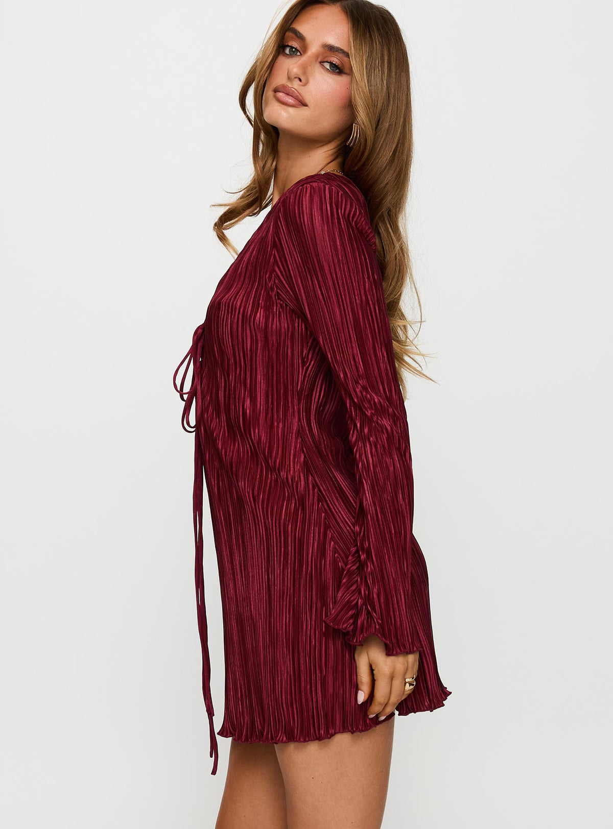 side view of model wearing Princess Polly Malop Long Sleeve Mini Dress Burgundy Plunger 