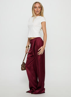 front view of model wearing Princess Polly Soulstar Satin Pants Wine Mid Rise Pants 
