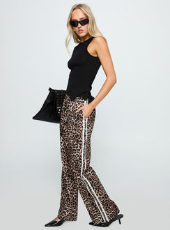 side view of model wearing Princess Polly Buzzer Track Pants Leopard High Waisted Pants 
