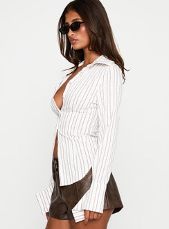 side view of model wearing Princess Polly Madlin Long Sleeve Top Beige Stripe Full Sleeves V-Neck 