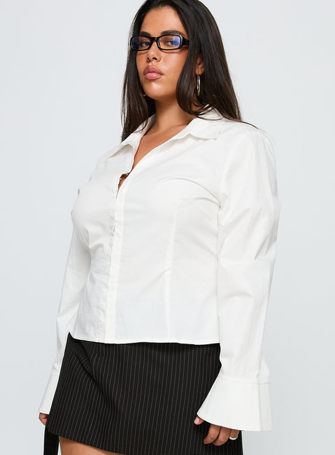 side view of model wearing Princess Polly By The Phone Long Sleeve Collared Top White Curve Full Sleeves V-Neck 
