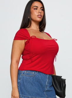 side view of model wearing Princess Polly Daena Tie Detail Top Red Curve Short Sleeves Square Neck 