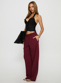 side view of model wearing Princess Polly Jaysa Baggy Wide Leg Pant Burgundy Pinstripe Mid Rise Pants Pants 