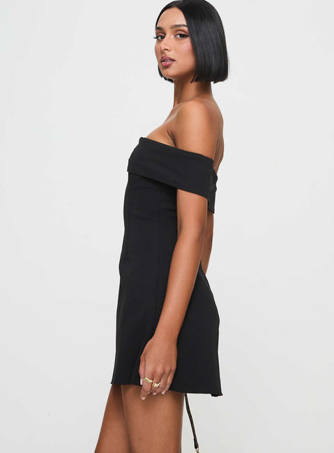side view of model wearing Princess Polly Lanes Off The Shoulder Mini Dress Black Tall Sweetheart Neckline 