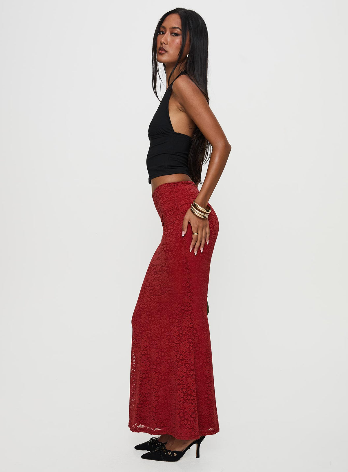   side view of model wearing Princess Polly Silene Maxi Skirt Red 