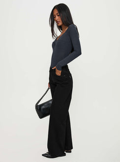 side view of model wearing Princess Polly Colemane Mid Rise Denim Jeans Black High Waisted 