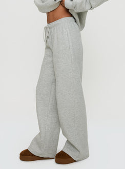 side view of model wearing Princess Polly Princess Polly Wide Leg Track Pant Bubble Text Grey Marle / Green Pants 