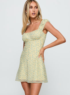 side view of model wearing Princess Polly Seyani Mini Dress Yellow Sweetheart Neckline 