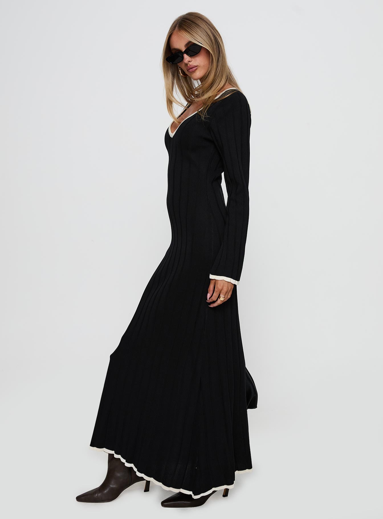 side view of model wearing Princess Polly Claira Long Sleeve Maxi Dress Black Plunger 
