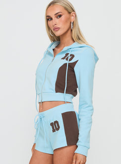 side view of model wearing Princess Polly Notable Double Zipper Jumper Blue cropped 